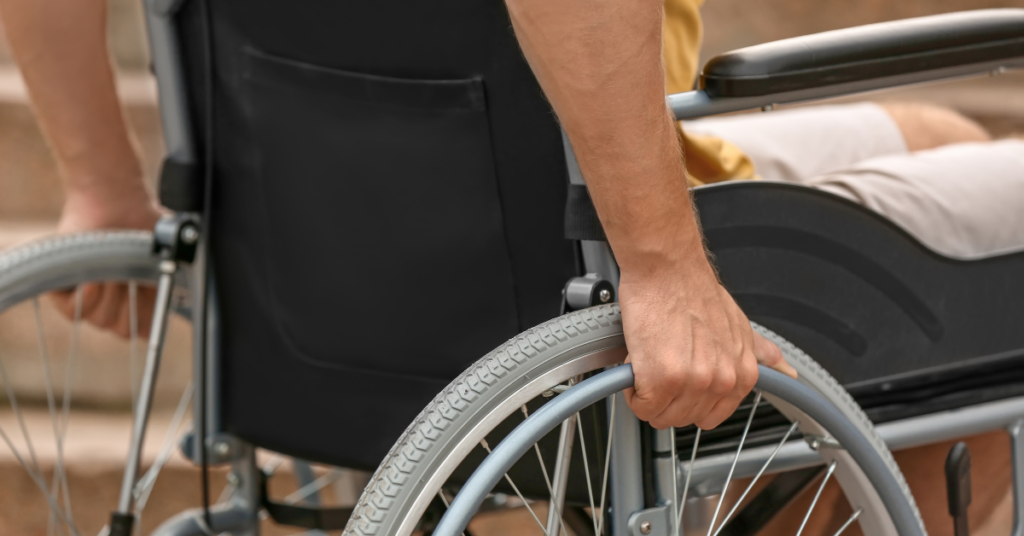 Image of a person in a wheelchair heading to a lawyer for social security benefits in Raleigh.