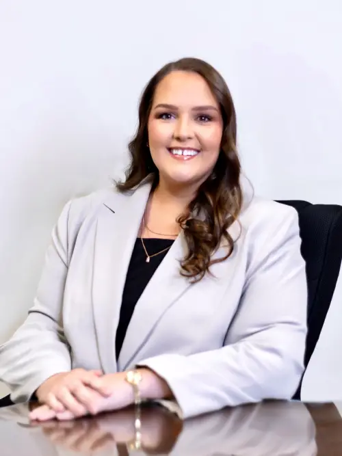Carmen Ezzell professional headshot at O’Malley Tunstall law firm