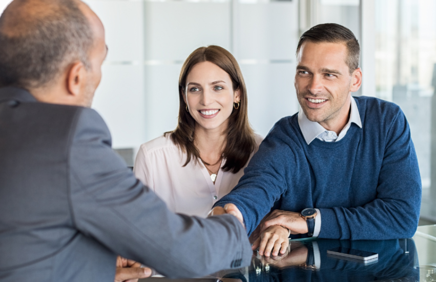 Image of a person shaking hands with a lawyer.